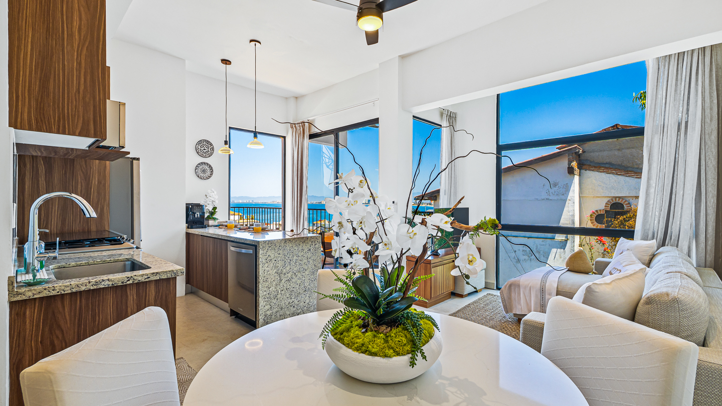 Living room with doors open to the terrace