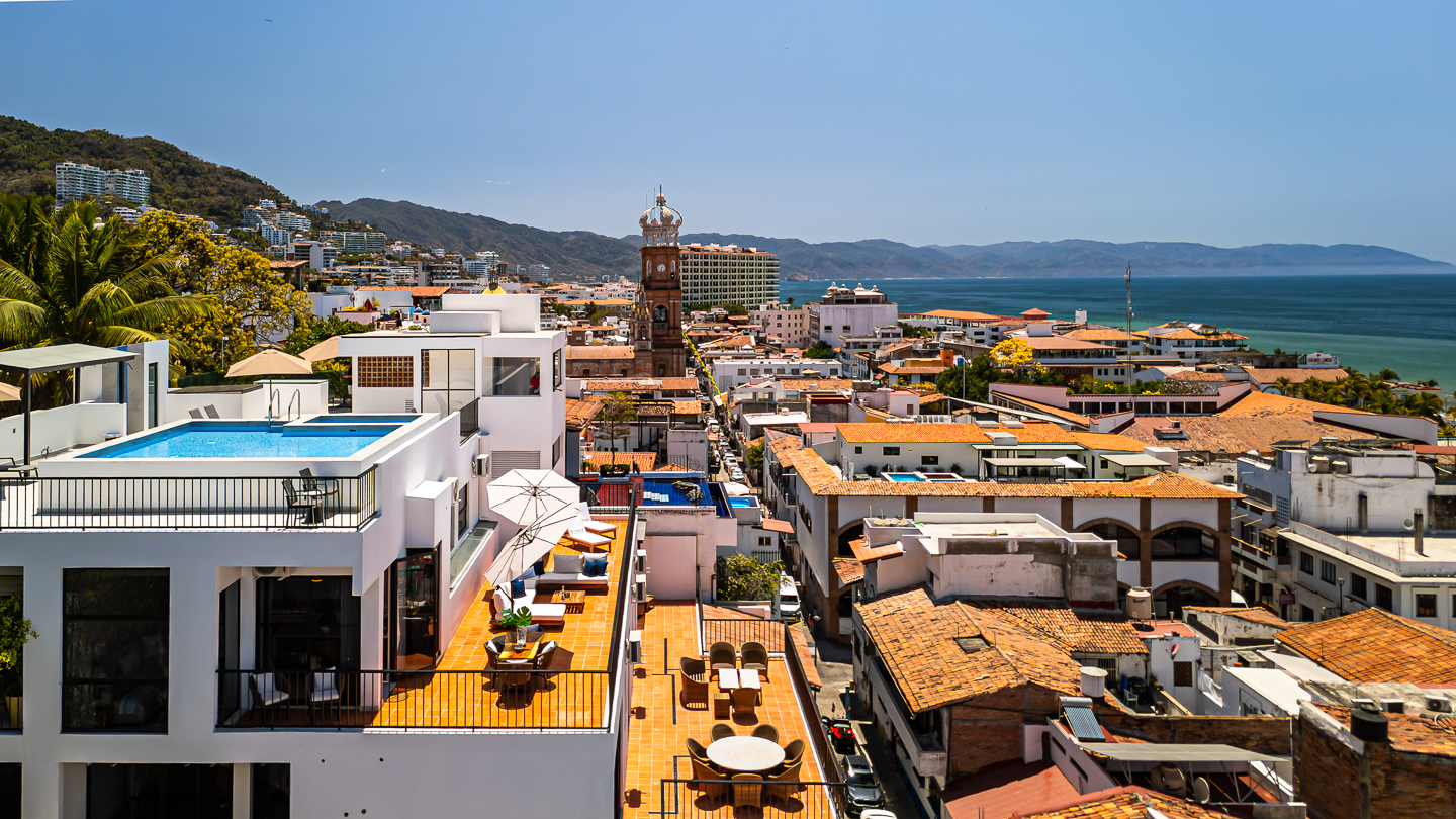 El Centro streets leading toward the Malecón in Puerto Vallarta at golden hour